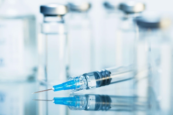 syringe and medication vials
